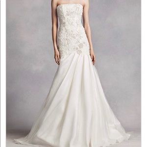 Vera Wang White strapless wedding dress.